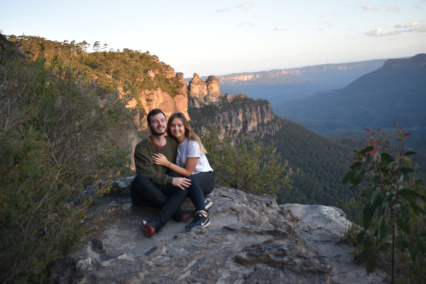 A couple sat looking a the view of The Blue Mountains, Sydney,