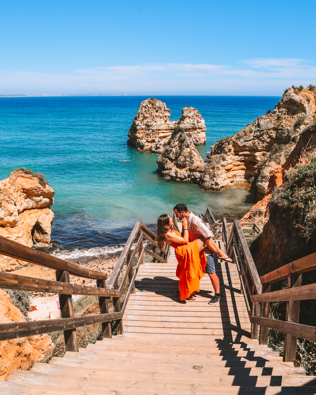 Most impressive spot to visit in the Algarve, Praia Do Camilo - travel couple