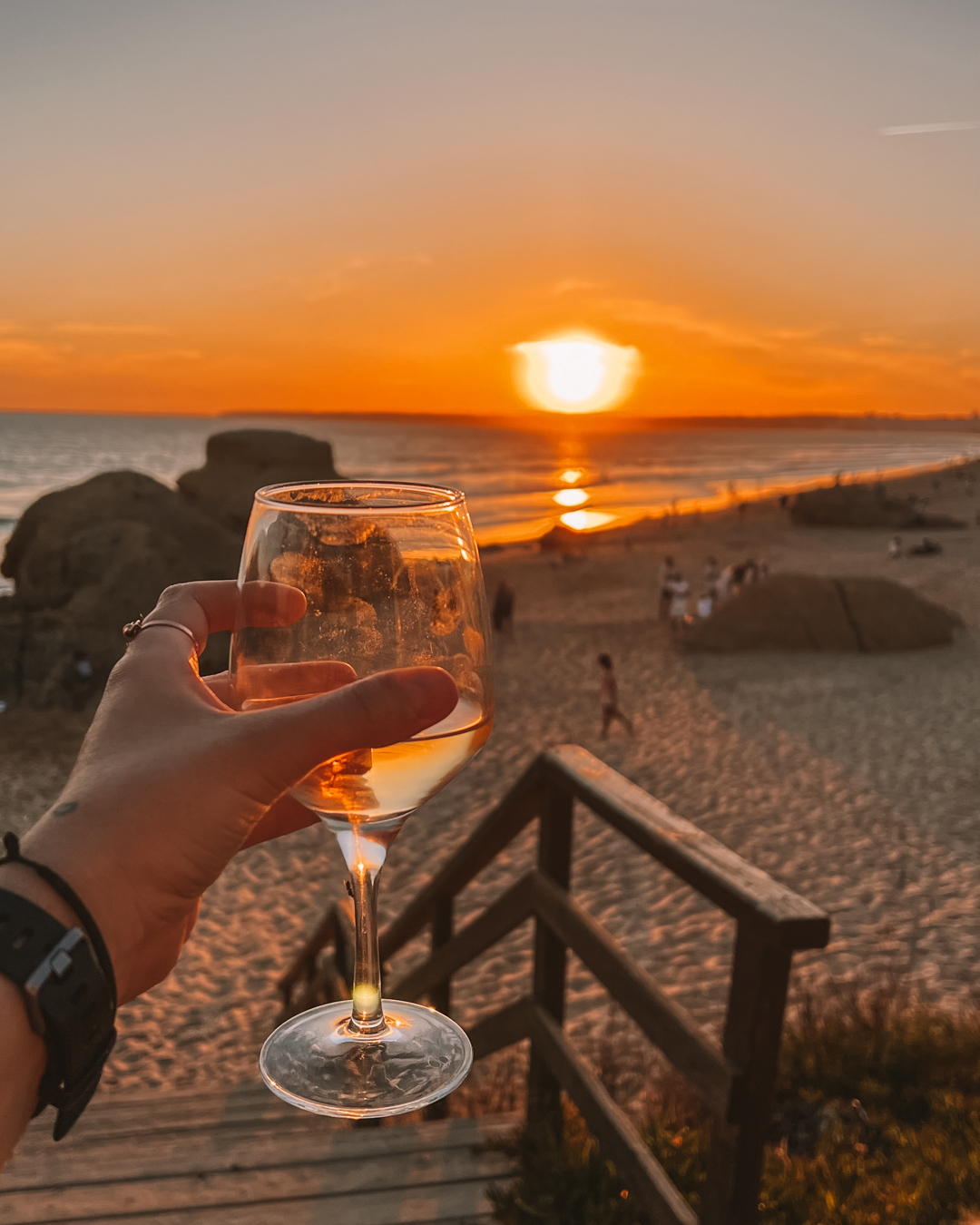 Sunset with wine over Praia da Gale - Top spots to visit in the Algarve