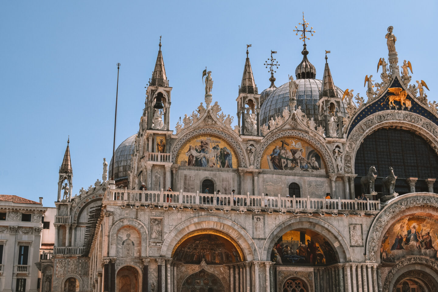 Visit St. Mark's Square (Piazza San Marco) and St. Mark's Basilica