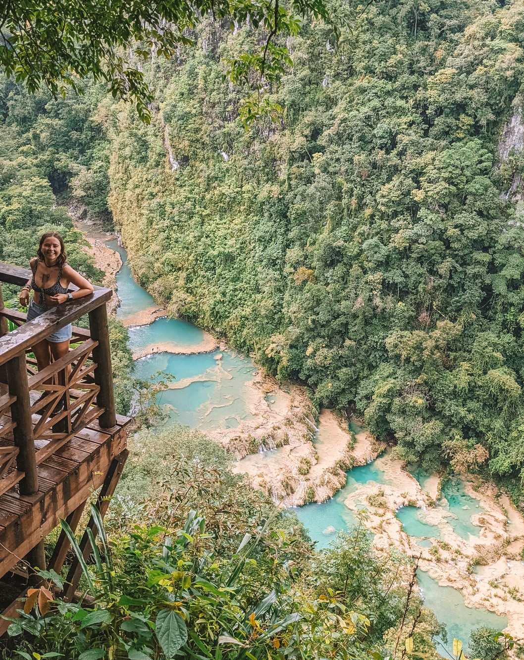 Reanna stood with the Semuc Champey pools behind her