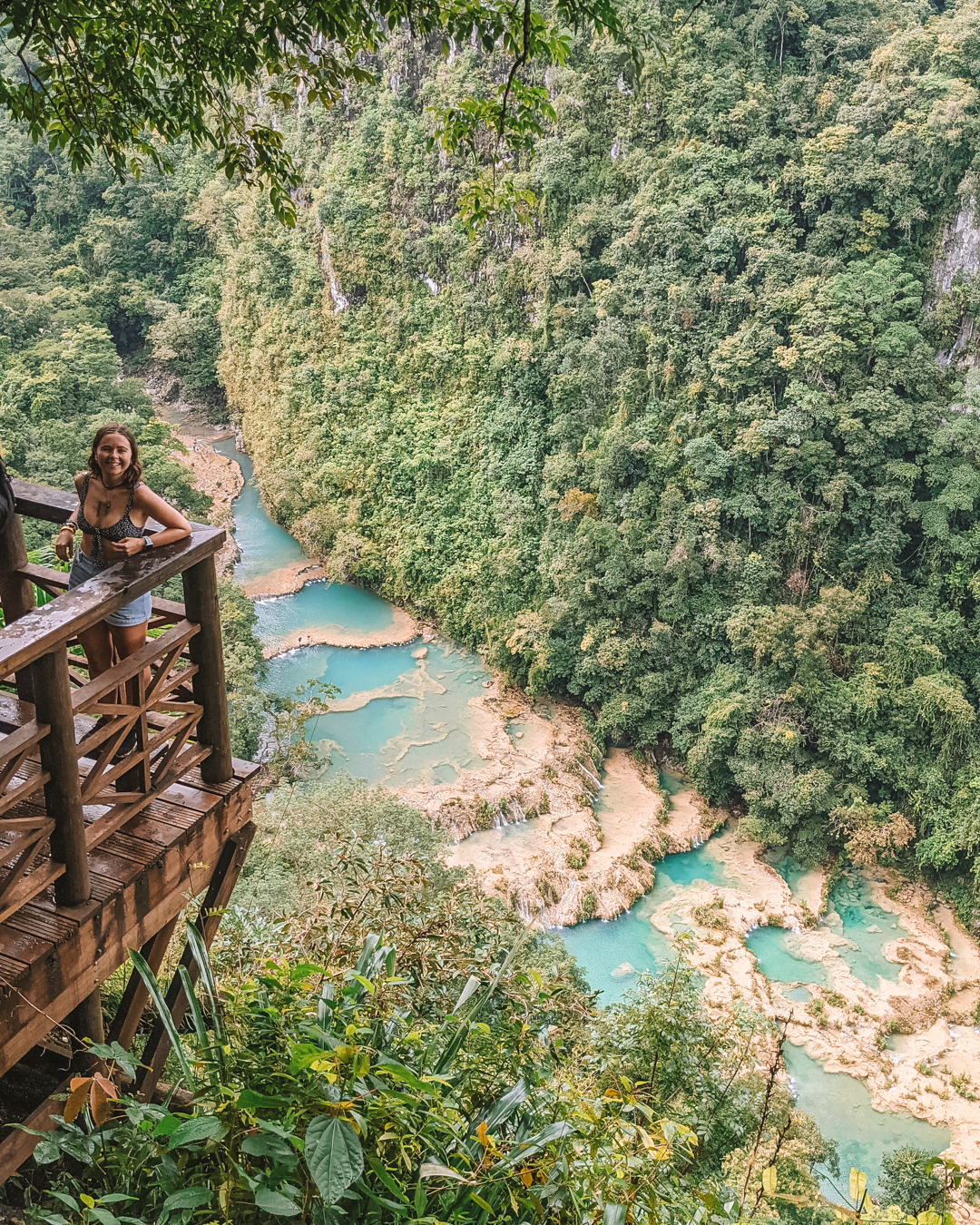 Reanna at the viewpoint overlooking the blue pools in Semuc Champey