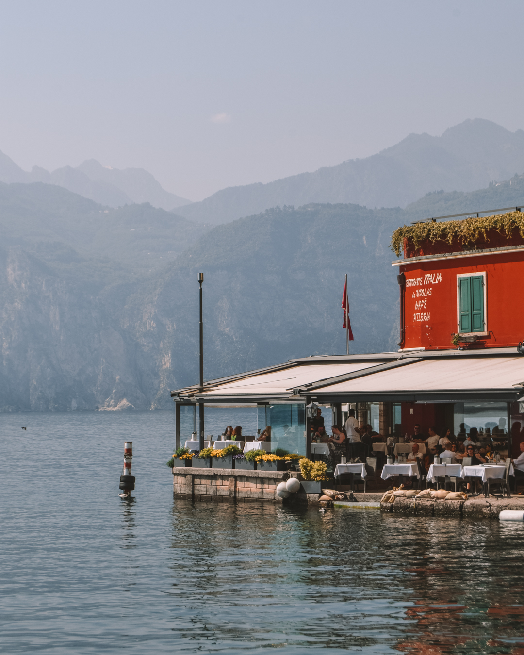 A red restaurant on the water in Malcesine