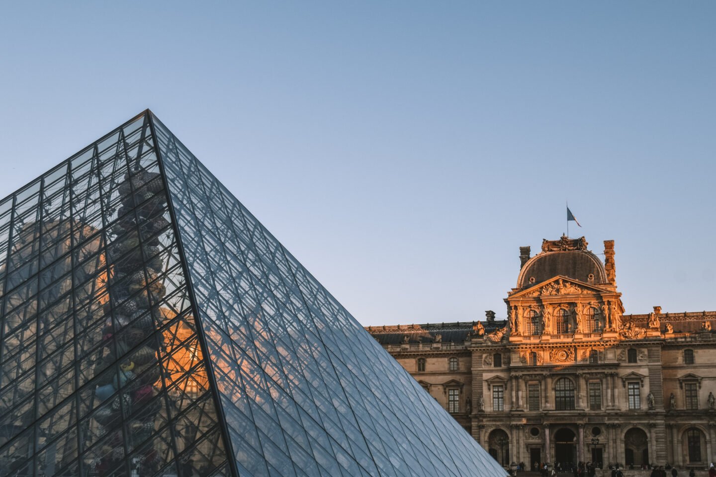 The Louvre, Paris and surrounding buildings at sunset