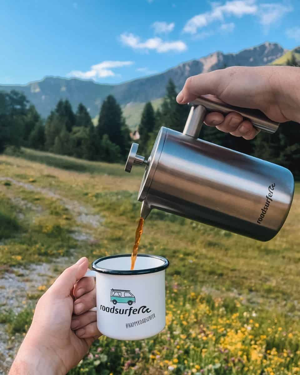 Pouring coffee in the mountains