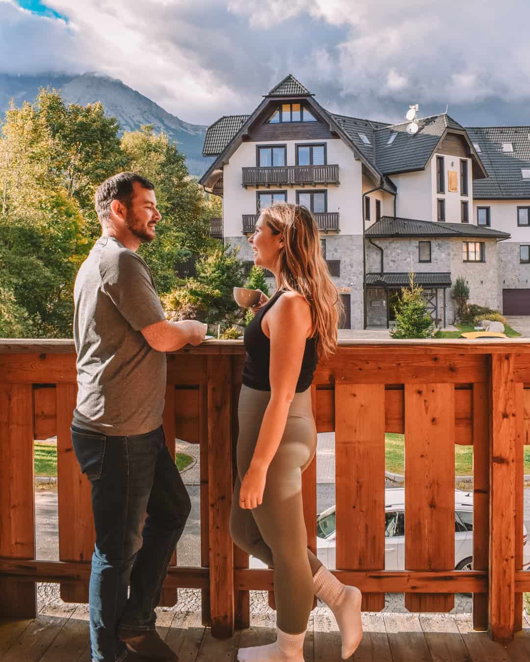 Chris and Reanna stood on their balcony in Hotel Aplend 
